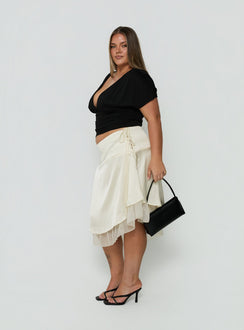 Designed with the Rosemead Satin Midi Skirt Cream Curve in womens-skirts with midi length side view of model wearing