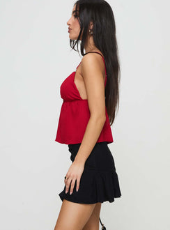   side view of model wearing Princess Polly Konstantina Mini Skirt Black Mini Skirts Skirts 