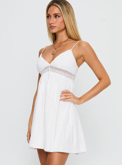 side view of model wearing Princess Polly Bodee Mini Dress White V-Neck 