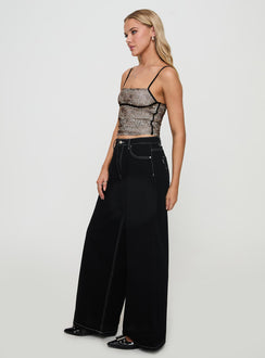 side view of model wearing Princess Polly Naylor Wide Leg Jeans Mid Black High Waisted 