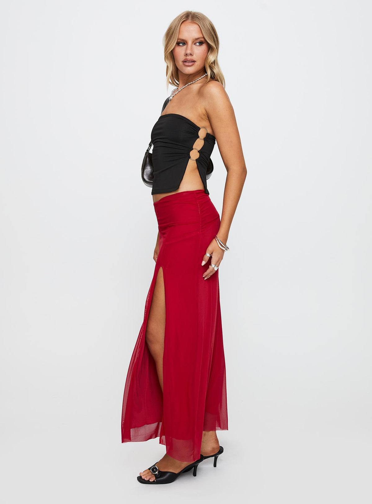   side view of model wearing Princess Polly Quancita Mesh Maxi Skirt Red Maxi Skirts Skirts 