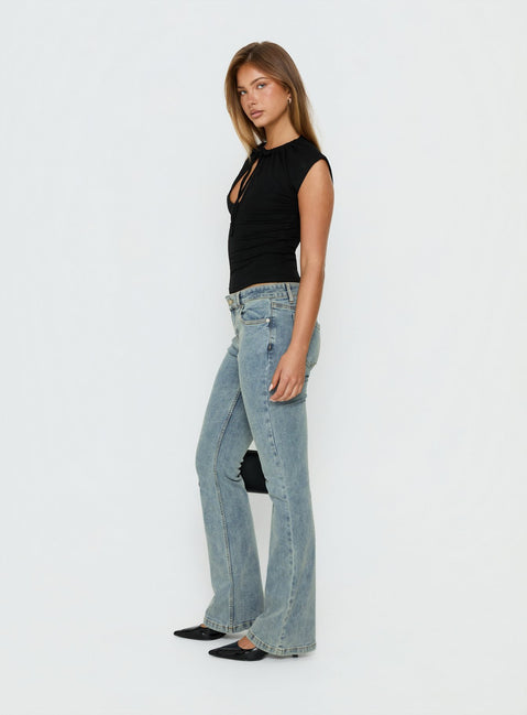 Presenting Bethany Low Rise Bootleg Jeans Ice Wash womens-jeans side view of model wearing Princess Polly