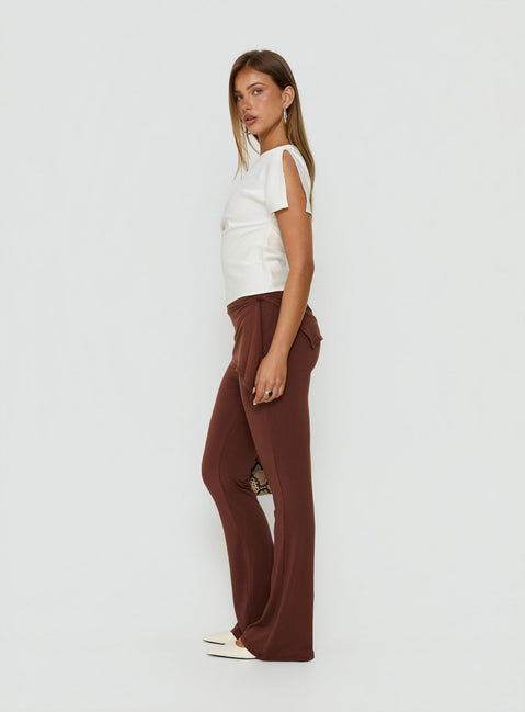 Crafted from sienna fabric the Masimo Layered Pants Chocolate womens regular pants feature high-rise and wide-leg styling side view of model wearing Princess Polly