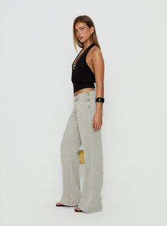 Showcasing the Slow Ride Mid Rise Bootleg Belted Jeans Desert Grey in womens-jeans side view of model wearing Princess Polly