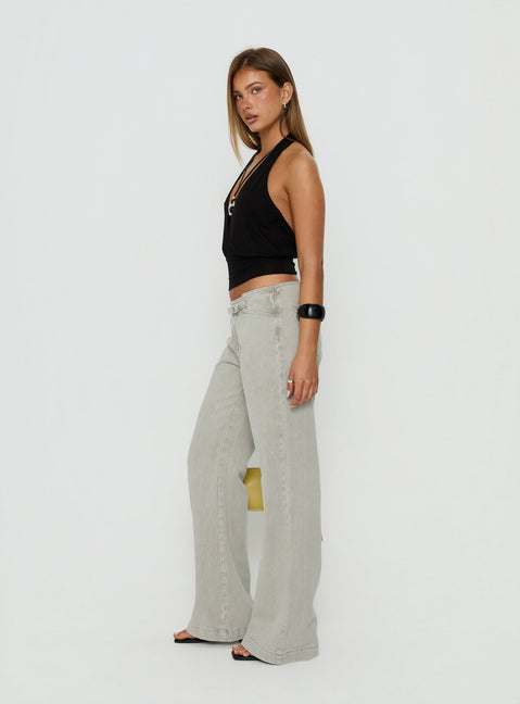 Showcasing the Slow Ride Mid Rise Bootleg Belted Jeans Desert Grey in womens-jeans side view of model wearing Princess Polly