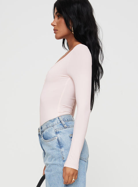side view of model wearing Princess Polly Delgado Long Sleeve Bodysuit Pink Long Sleeve Tops 