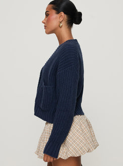 side view of model wearing Princess Polly Osias Cable Knit Cardigan Navy Cropped Jumpers 