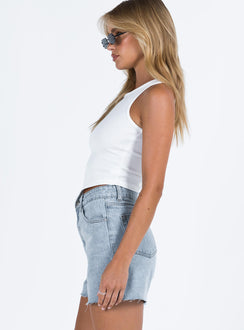 side view of model wearing Princess Polly Laurena Denim Shorts High Waisted Shorts 