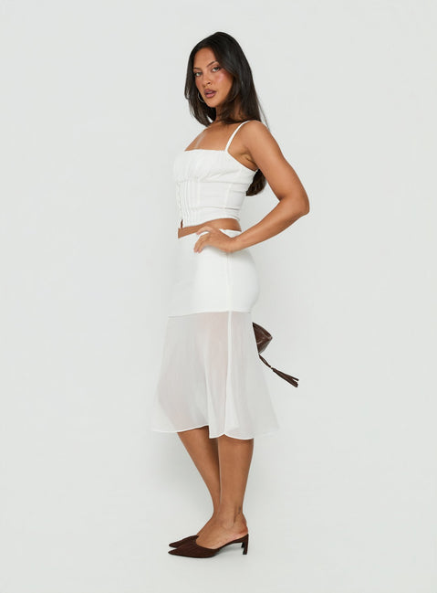 Featuring the Camy Sheer Panelled Midi Skirt White womens-skirts in midi length side view of model wearing Princess Polly