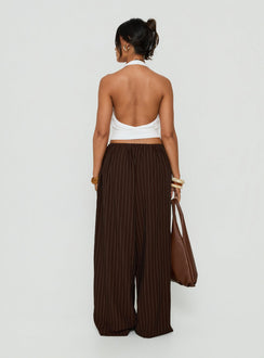 Designed with the Bungala Oversized Relaxed Pants Brown Pinstripe womens-regular-pants with mid-rise back view of model wearing Princess Polly