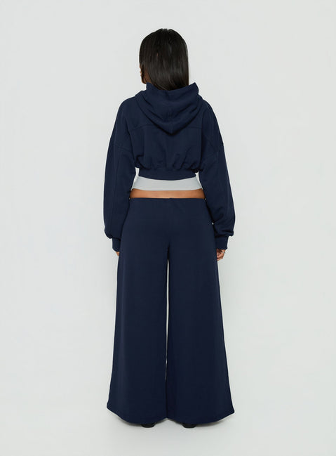 Crafted from fleece the Kaeya Wide Leg Low Rise Pants Navy in womens regular pants back view of model wearing Princess Polly