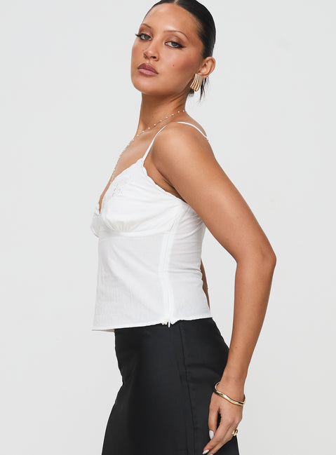 side view of model wearing Princess Polly Aruba Embroidered Cami White Sleeveless Plunger 
