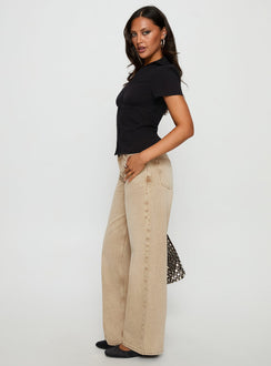 side view of model wearing Princess Polly Ellanor Low Rise Straight Leg Jeans Tan Low Rise Jeans 