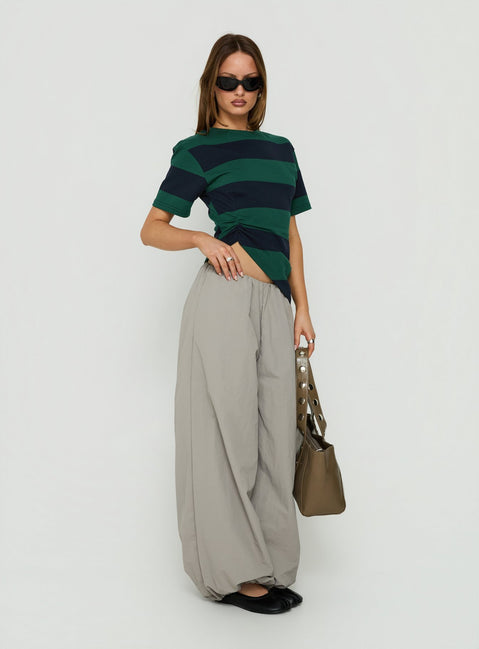 Showcasing the Your Orbit Nylon Baggy Pants Grey womens-regular-pants with high-rise front view of model wearing