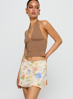   side view of model wearing Princess Polly Feed The Soul Mini Skirt Floral Multi Mini Skirts 