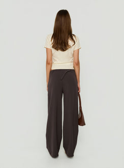 Featuring Mericana Low Rise Wide Leg Pants in Brown womens regular pants with low-rise waist back view of model wearing Princess Polly