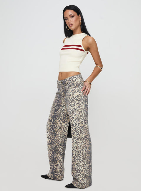 side view of model wearing Princess Polly Top Model Jeans Leopard Fade Mid Rise 