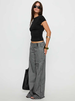 side view of model wearing Princess Polly Cedars Low Rise Pant Grey Stripe Low Rise Pants 