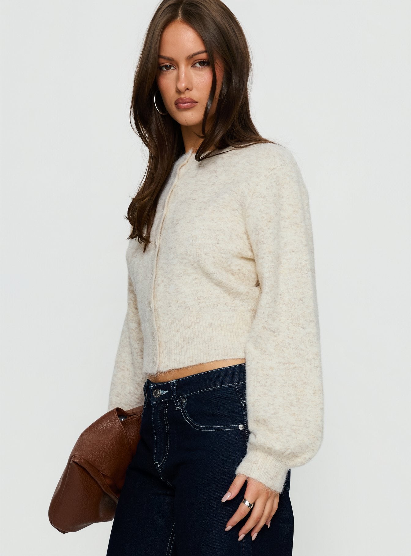 side view of model wearing Princess Polly Dawsen Button Down Cardigan Cream cropped 