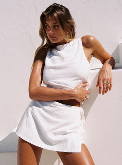 front view of model wearing Princess Polly Gulliver Tie Side Mini Skort White Petite High Waisted Shorts 