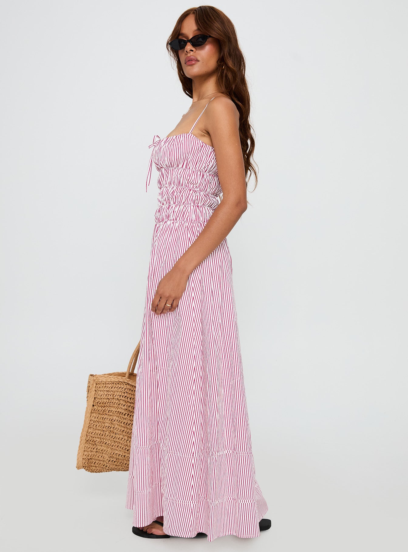 side view of model wearing Princess Polly Loralei Shirred Maxi Dress Red Stripe Square Neck 