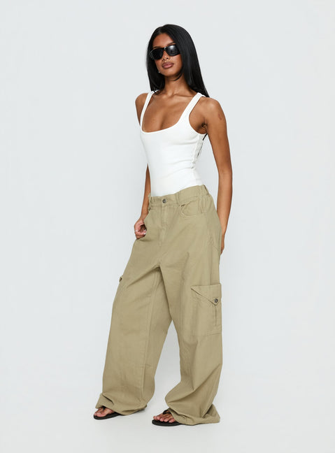 Featuring the Sylene Pocket Detail Cargo Pants Khaki in womens-regular-pants with high-rise side view of model wearing Princess Polly