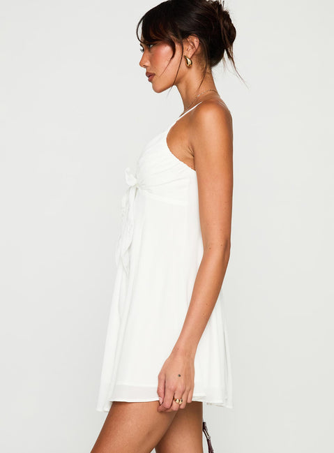 side view of model wearing Princess Polly Moon Quartz Mini Dress White Plunger 