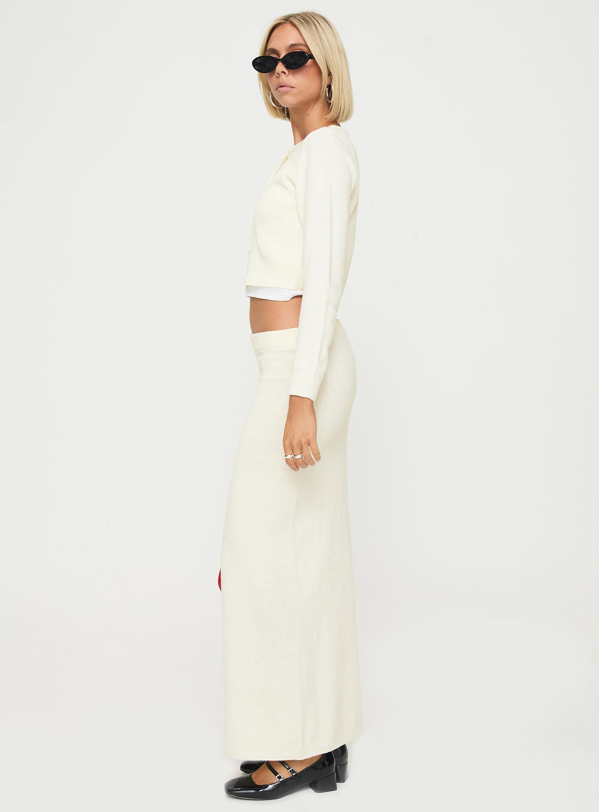 side view of model wearing Princess Polly Collase Knit Sweater Cream cropped 