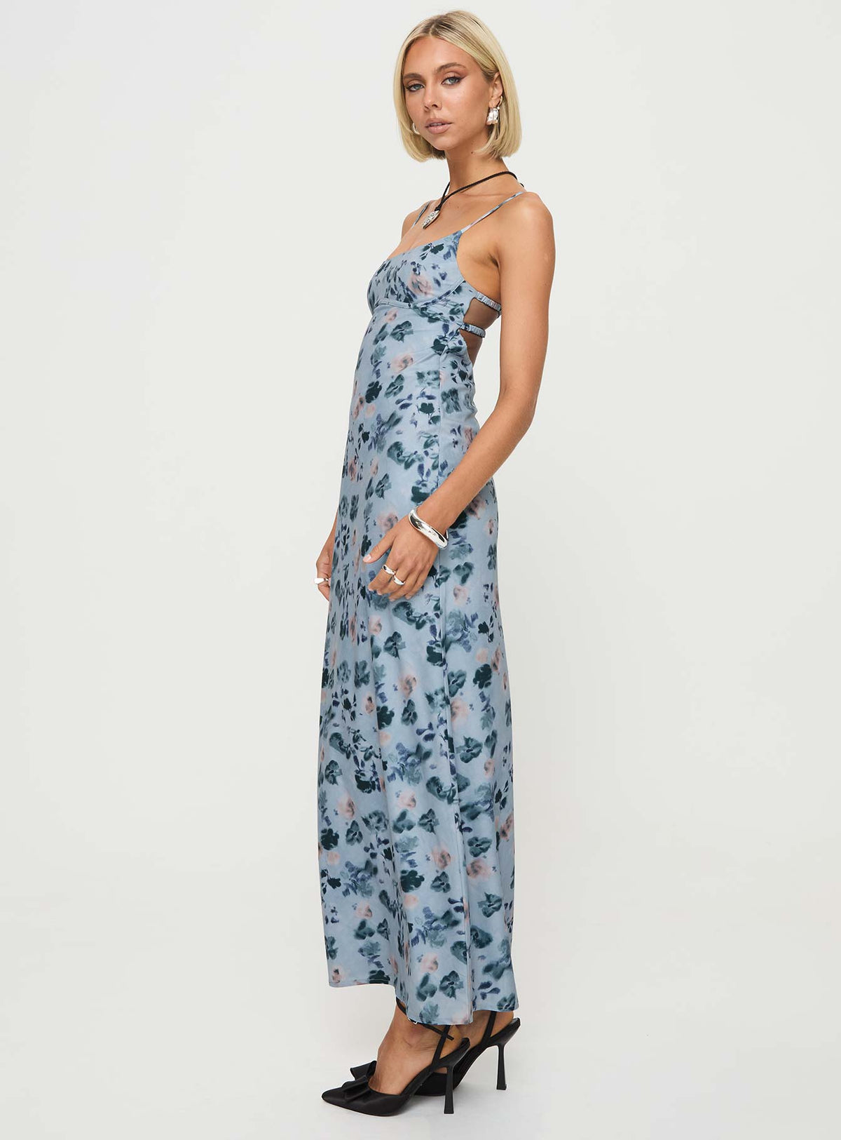 side view of model wearing Princess Polly Ravia Maxi Dress Blue / Floral Square Neck 