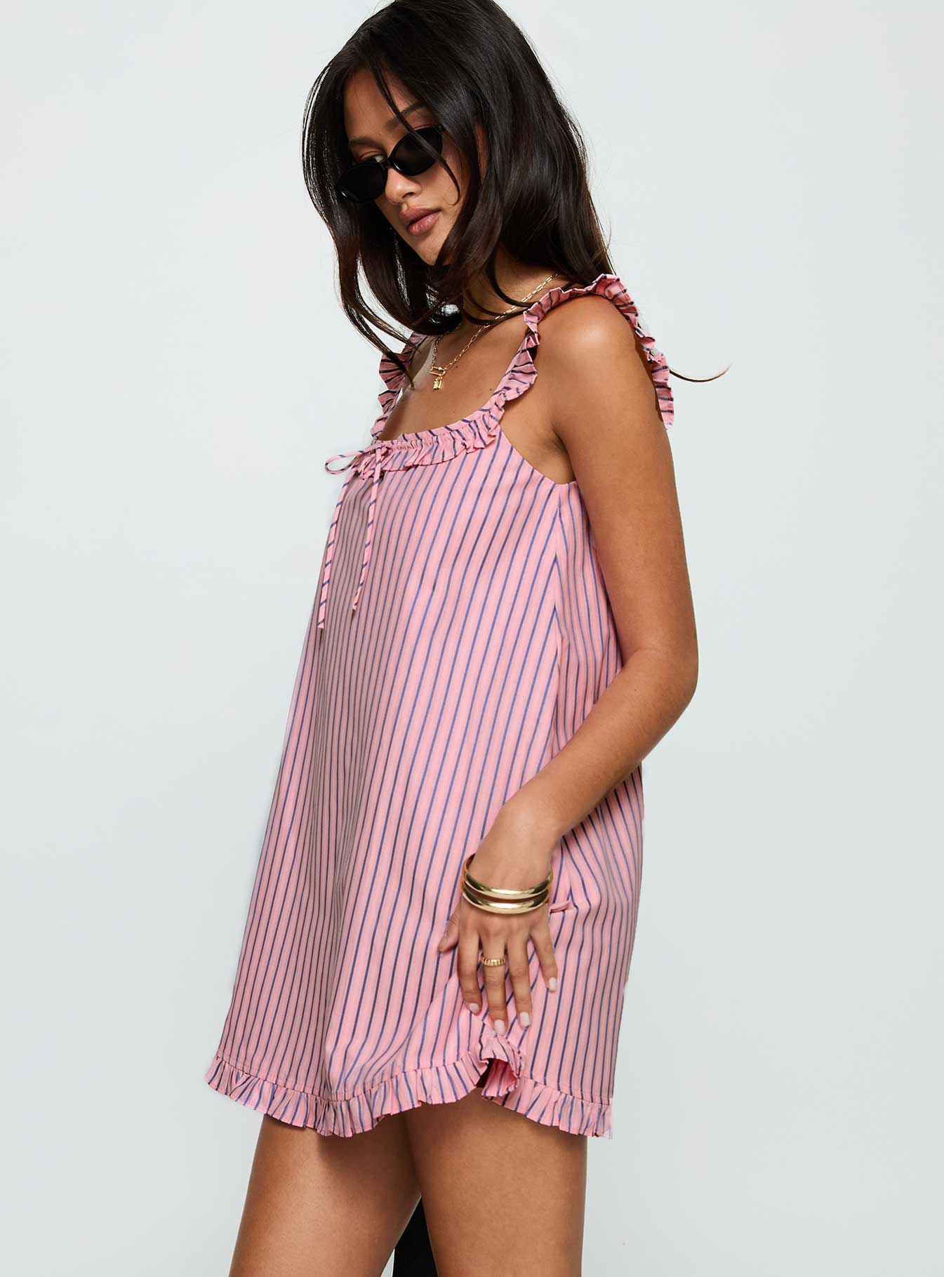 side view of model wearing Princess Polly Zalina Babydoll Mini Dress Pink Stripe Square Neck 