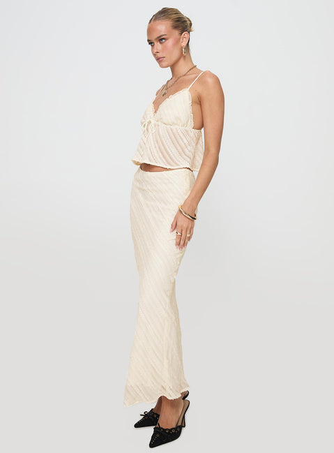  side view of model wearing Princess Polly Jacintha Maxi Skirt Cream Maxi Skirts Skirts 