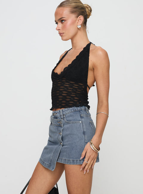   side view of model wearing Princess Polly Denis Mini Denim Skirt Light Blue Mini Skirts Skirts 