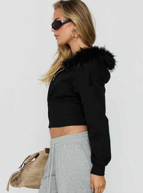 Crafted from the Ramonda Faux Fur Hooded Jumper Black womens-jumpers with short length side view of model wearing Princess Polly