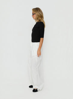 Explore the Mankind Baggy Cargo Pants White in womens-regular-pants with mid-rise, side view of model wearing Princess Polly