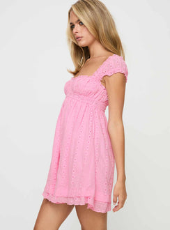 side view of model wearing Princess Polly Carlita Mini Dress Pink Petite Square Neck 