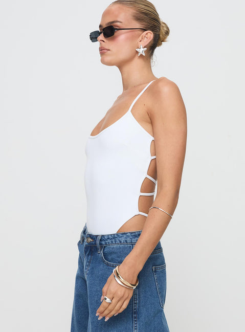 side view of model wearing Princess Polly All Tied Up Bodysuit White Tall Sleeveless 