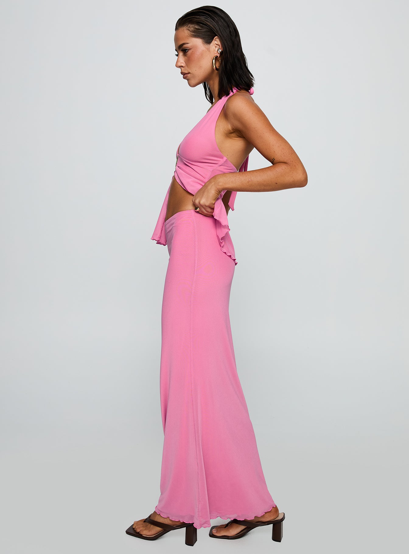   side view of model wearing Princess Polly De Angelo Maxi Skirt Pink Maxi Skirts Skirts 