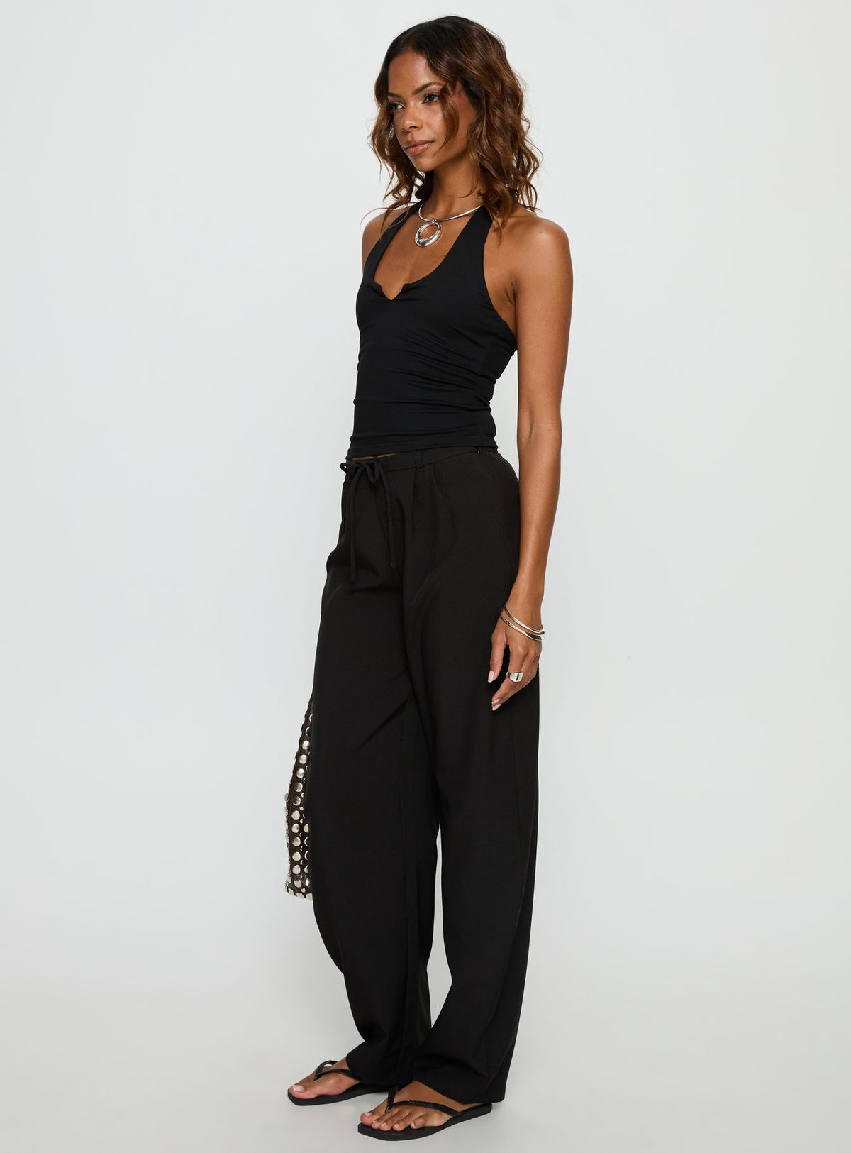 side view of model wearing Princess Polly Triffid Barrel Leg Pants Black High Rise Pants Pants 