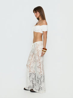 side view of model wearing Princess Polly Rosadonna Lace Flare Pants Cream Mid Rise Pants 