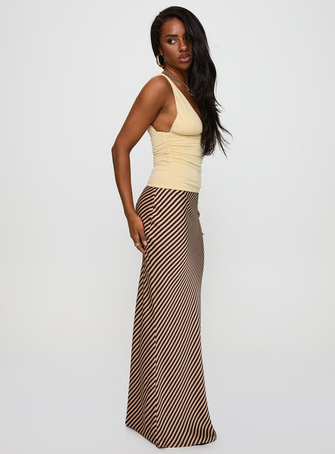 Elevate your wardrobe with the Eliena Maxi Skirt Multi Tall womens-skirts featuring maxi length side view of model wearing
