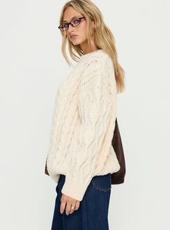Displaying the Rorey Cable Knit Crew Neck Sweater White womens-jumpers with oversized fit in long length detail view of model wearing Princess Polly