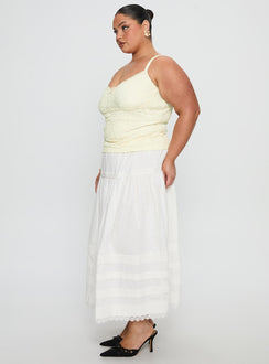   side view of model wearing Princess Polly Calling For You Flowy Maxi Skirt White Curve Maxi Skirts 