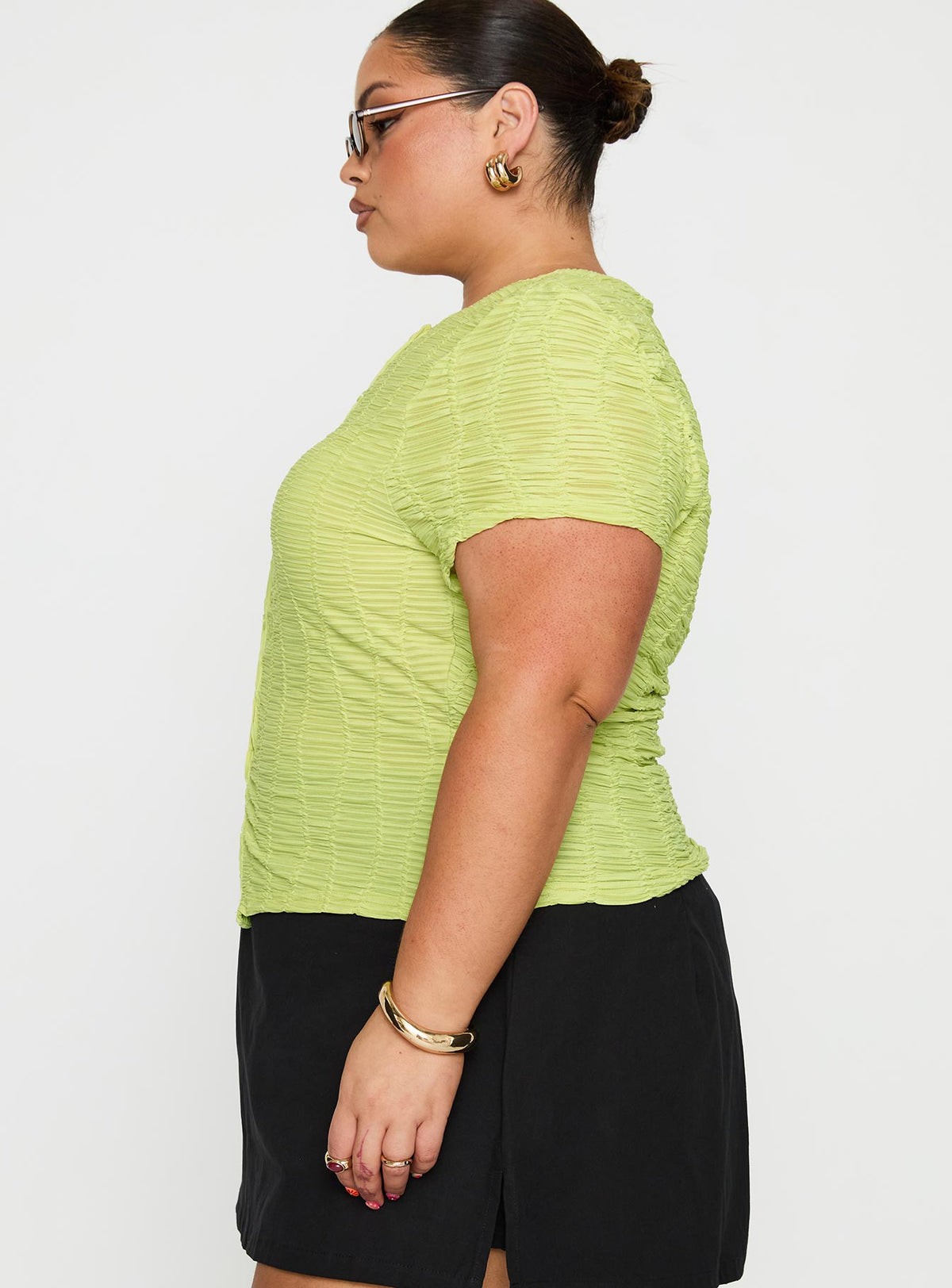 side view of model wearing Princess Polly Suzu Textured Top Green Curve Short Sleeves Crew Neck 