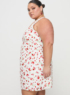side view of model wearing Princess Polly Dasha Mini Dress White Floral Curve Square Neck 