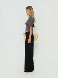 Featuring the Cedars Low Rise Pant Black womens-regular-pants with low-rise side view of model wearing