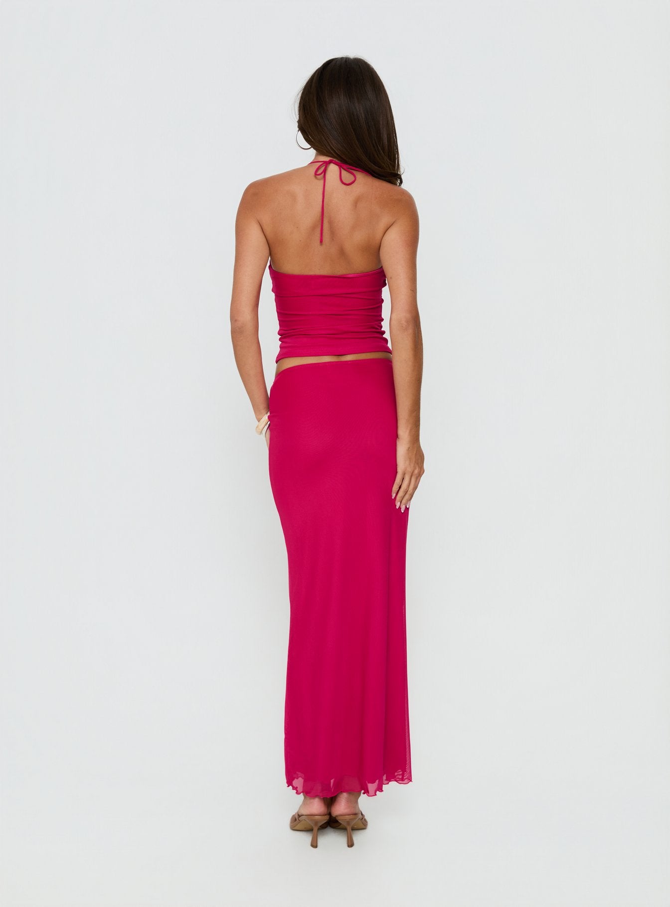 back view of model wearing Princess Polly Jailon Ruched Maxi Skirt Guava Maxi Skirts Skirts 