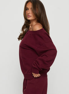 side view of model wearing Princess Polly Wellness Off the Shoulder Jumper Currant cropped 