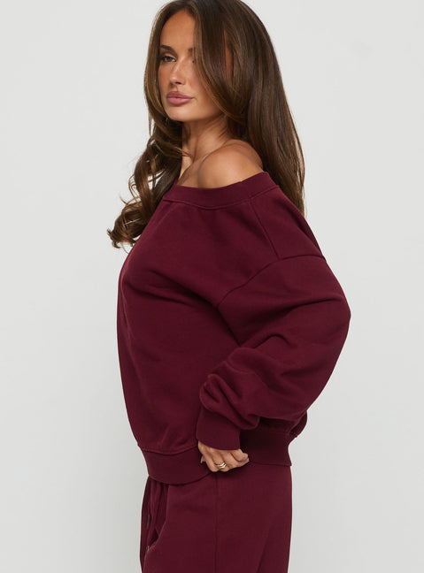 side view of model wearing Princess Polly Wellness Off the Shoulder Jumper Currant cropped 