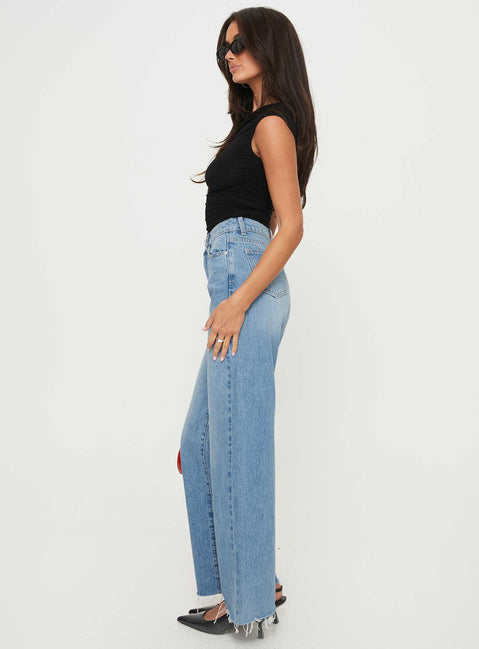 side view of model wearing Princess Polly Henesey High Rise Straight Leg Jeans Mid Blue Wash High Rise Jeans Jeans 