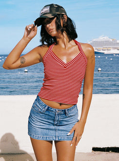   side view of model wearing Princess Polly Fossils Denim Mini Skirt Blue Mini Skirts 
